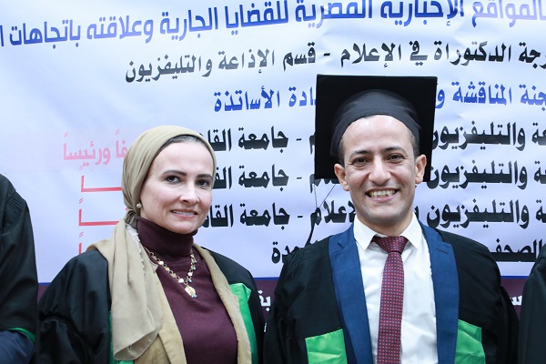 الاستاذة الدكتورة نشوة عقل مع الصحفي محمد سعودي