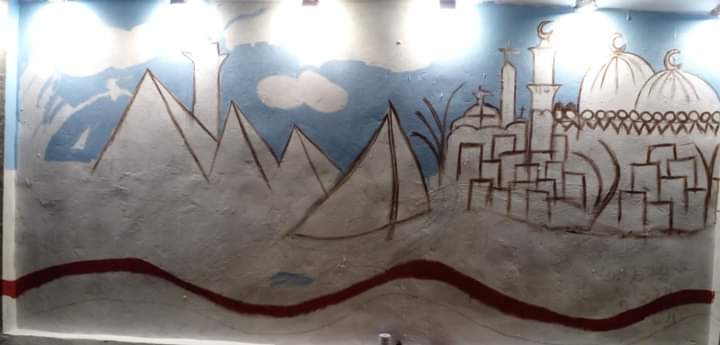 طالبات الثانوية الفنية بنات تبدع فى تزيين جدارية النصب التذكاري بالخارجة (4)