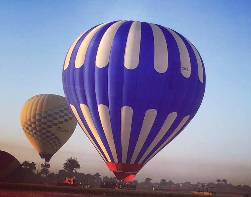 تحليق 60 رحلة بالون طائر بأكثر من 1450 سائحا فى سماء غرب الأقصر.. صور -  اليوم السابع