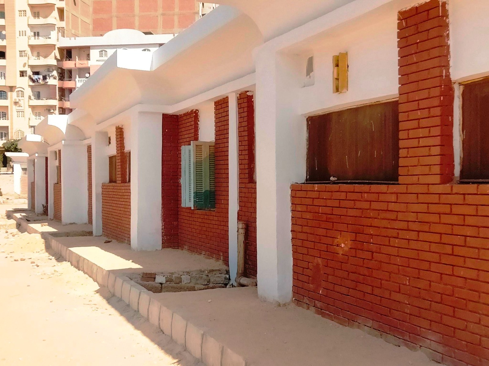 تطوير ورفع كفاءة قريتى النسيج اليدوى بحى الكوثر بتكلفة 3 ملايين جنيه (2)