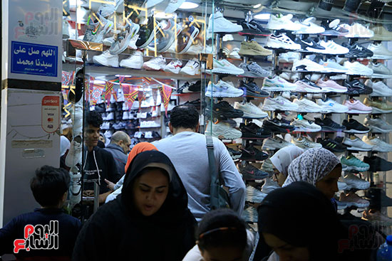 زحام شارع العريش بالجيزة لشراء ملابس العيد (21)