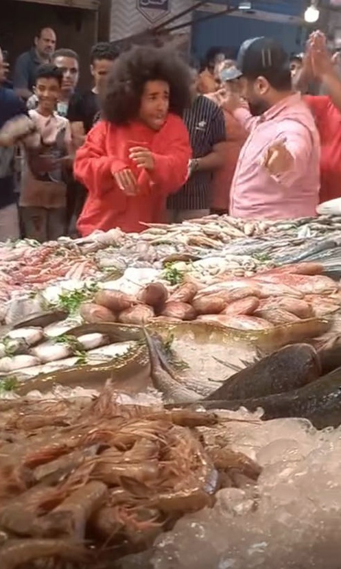 الرقص في سوق السمك