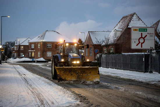 مساحة نت | شاهد: تساقط الثلوج يحول شوارع الدنمارك إلى لوحات فنية بيضاء (صور)