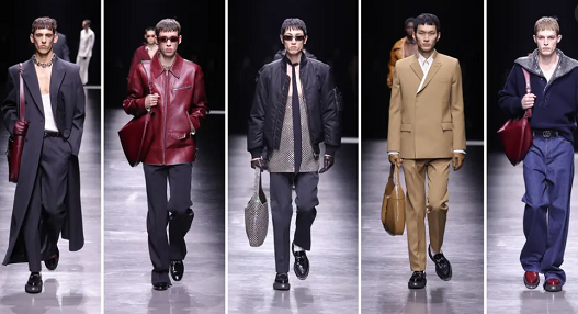 مجموعة مختلف من الشنط الكبيرة في أسبع الموضة الرجالى في ميلانو