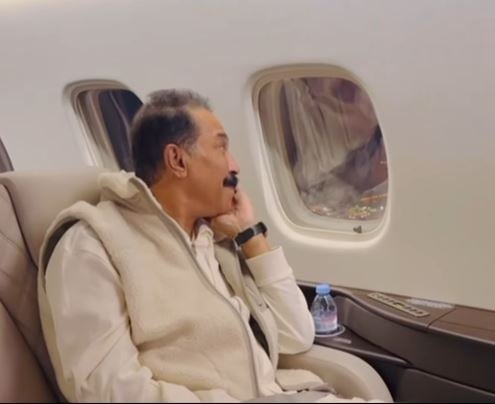 Abdullah Al-Ruwaished inside the plane during his return from his treatment trip in Germany