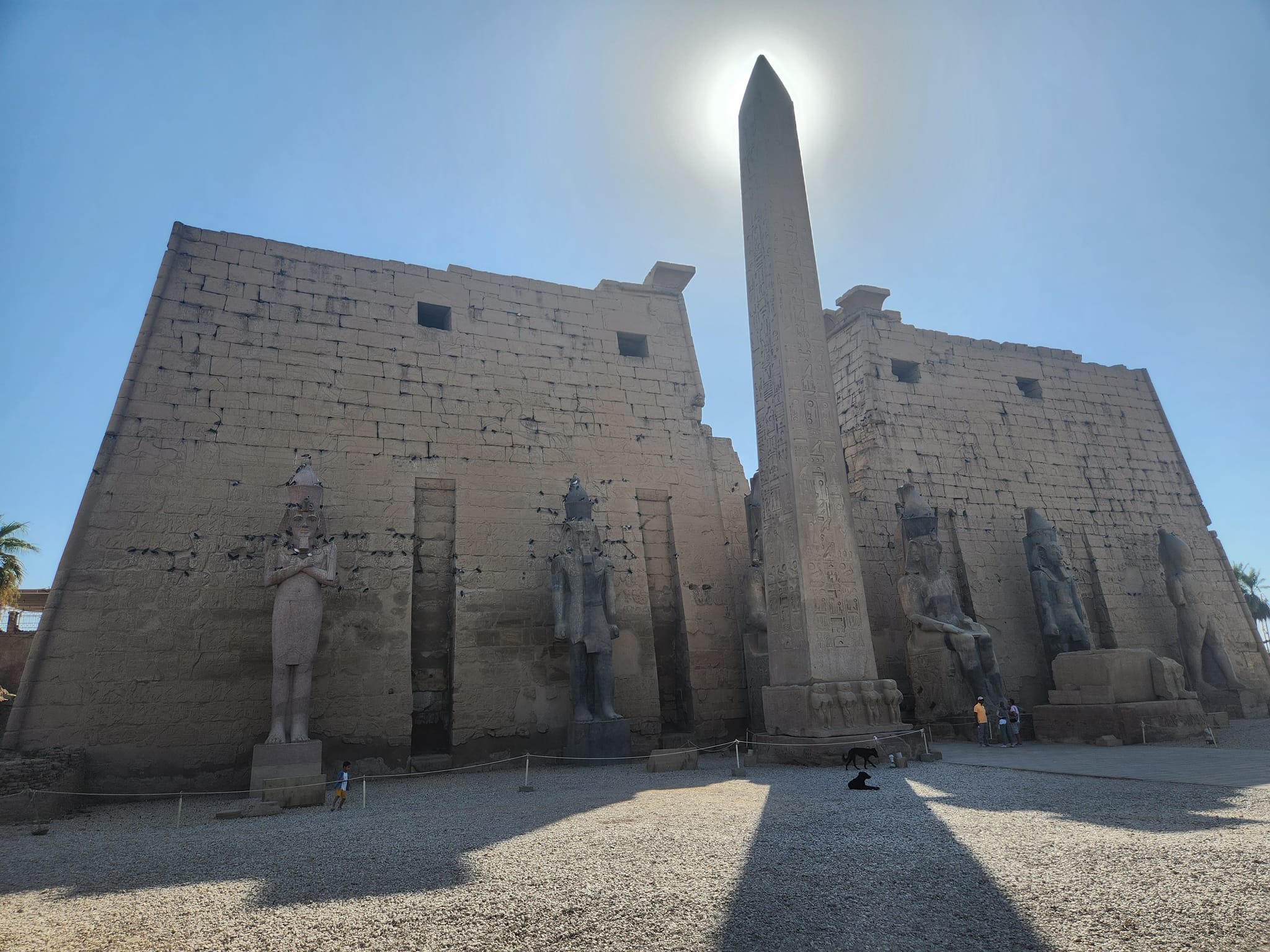 The facade of the historic Luxor Temple on the Luxor Corniche