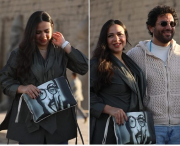 ايمى سمير غانم وحقيبة عليها صورة والدها