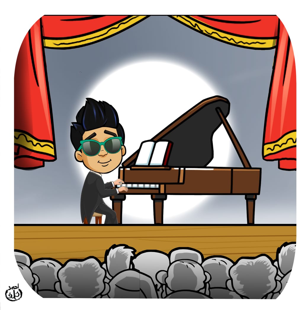 كريم وهو يعزف على البيانو