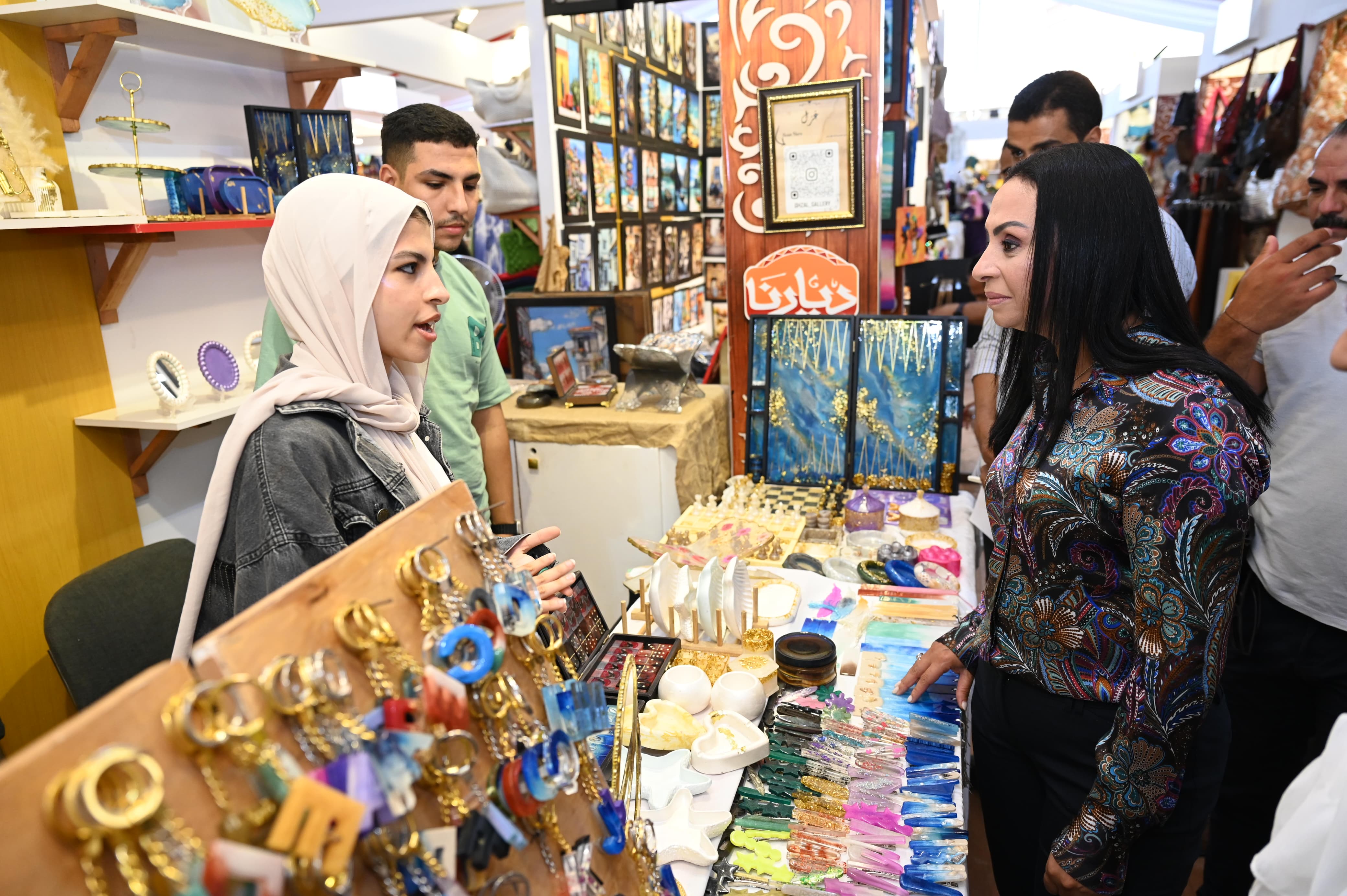 توفير ماكينات صرف آلي في معرض ديارنا للحرف اليدوية بالساحل الشمالى