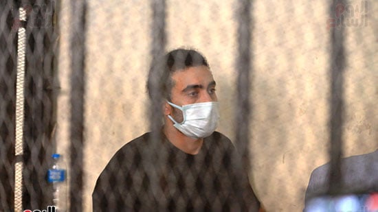 Ahmed Yasser Al-Mohammadi wears a mask