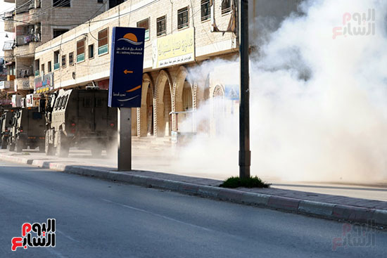الدخان المنبعث نتيجة الأشتباكات الدخان المنبعث نتيجة الأشتباكات