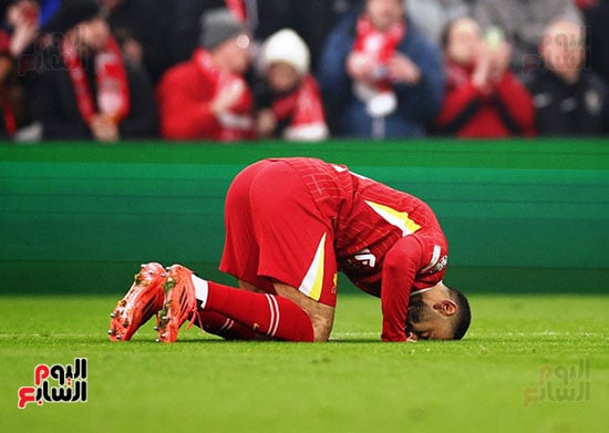 Mohamed Salah prostrates after scoring the first goal