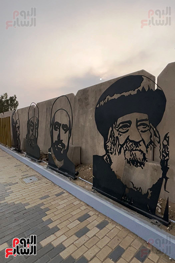 الشعراوى والبابا شنودة على جرافيتى بالطريق المؤدى للمتحف الكبير (3)