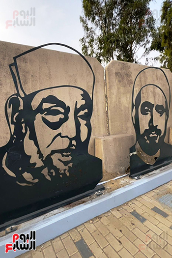 الشعراوى والبابا شنودة على جرافيتى بالطريق المؤدى للمتحف الكبير (2)