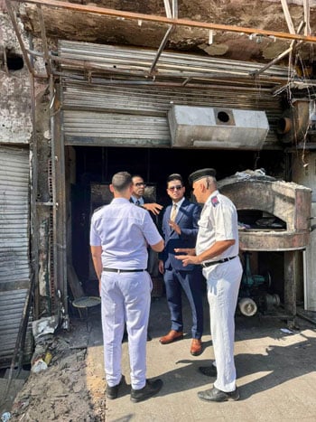 أحد أعضاء النيابة الإدارية خلال المعاينة أحد أعضاء النيابة الإدارية خلال المعاينة