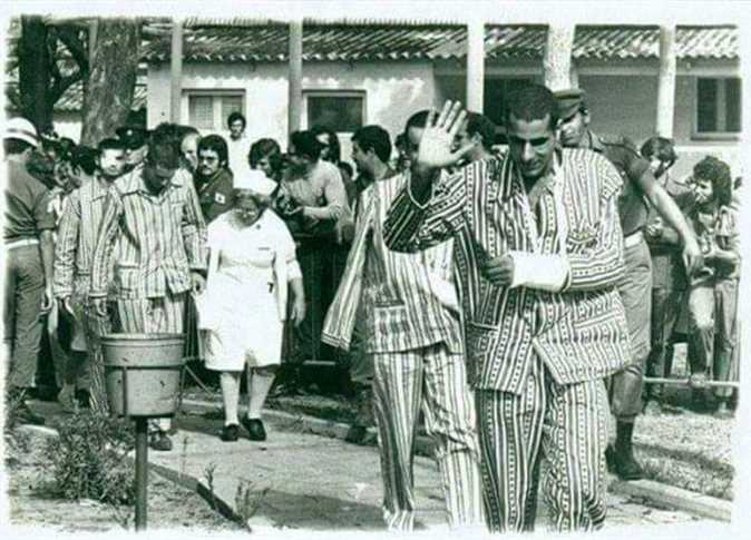 مشهد من ارتداء الأسرى للبيجامات الكستور - Copy - Copy - Copy مشهد من ارتداء الأسرى للبيجامات الكستور - Copy - Copy - Copy