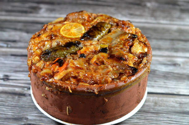طاجن ورق العنب بالكوارع طاجن ورق العنب بالكوارع