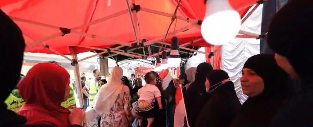 المرأة تتصدر المشهد في لجان الهرم.. زغاريد وأعلام احتفالًا بالتصويت (1)