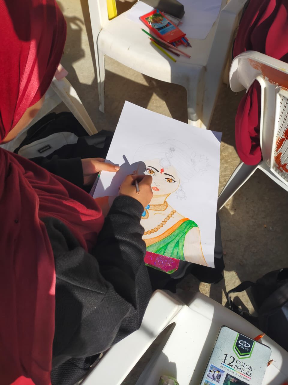 رسمه لفتاة هندية لطالبة