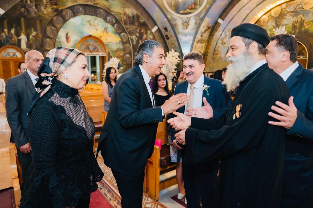 المستشار سامح عبد الحكم وزوجته