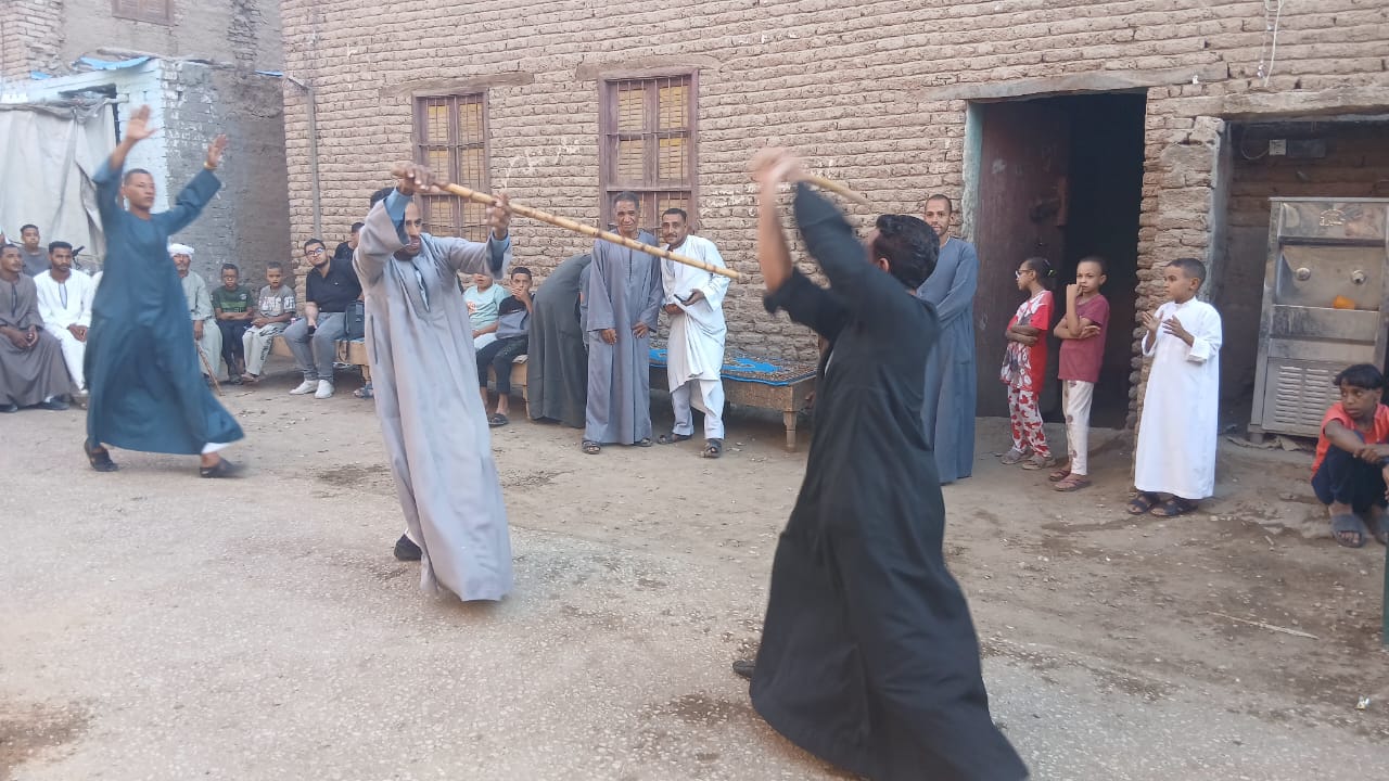 لعبة تحطيب بقرية كوم بلال 