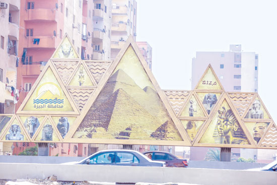 رسومات فرعونية على المنازل بالطريق الدائري فى المنيب رسومات فرعونية على المنازل بالطريق الدائري فى المنيب