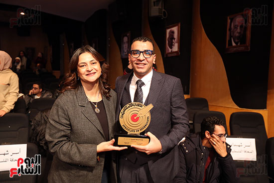 الزميل محمد سلمان مع علا الشافعى