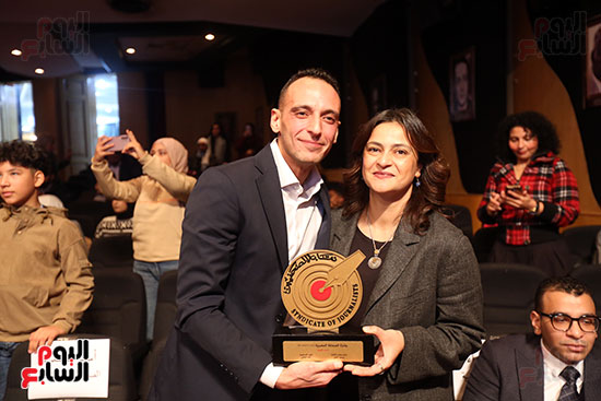 الزميل أحمد العدل بصحبه الكاتبه علا الشافعى