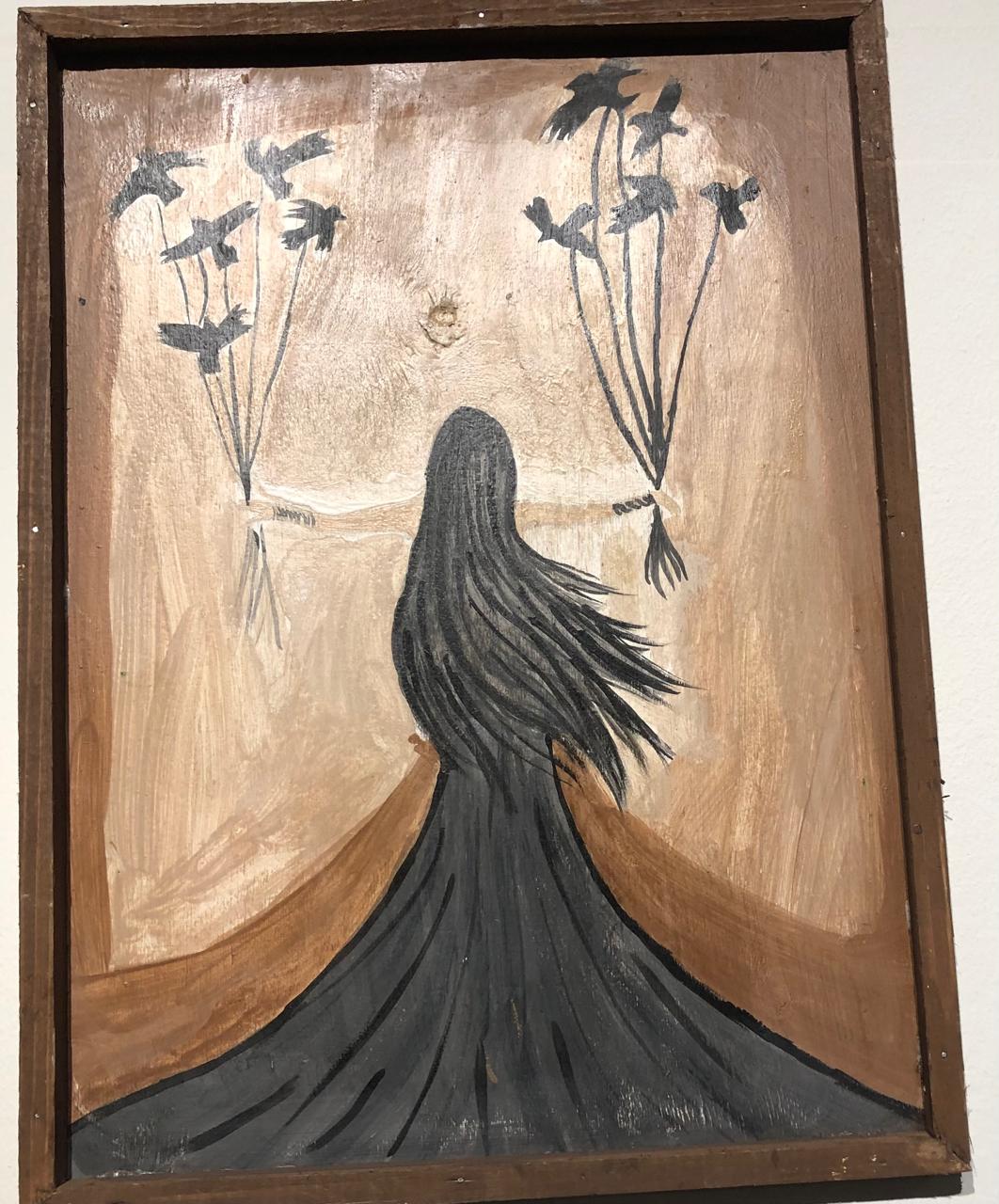 لوحة لإحدة الفتيات الناجيات من براثن الاحتيال الرقمى