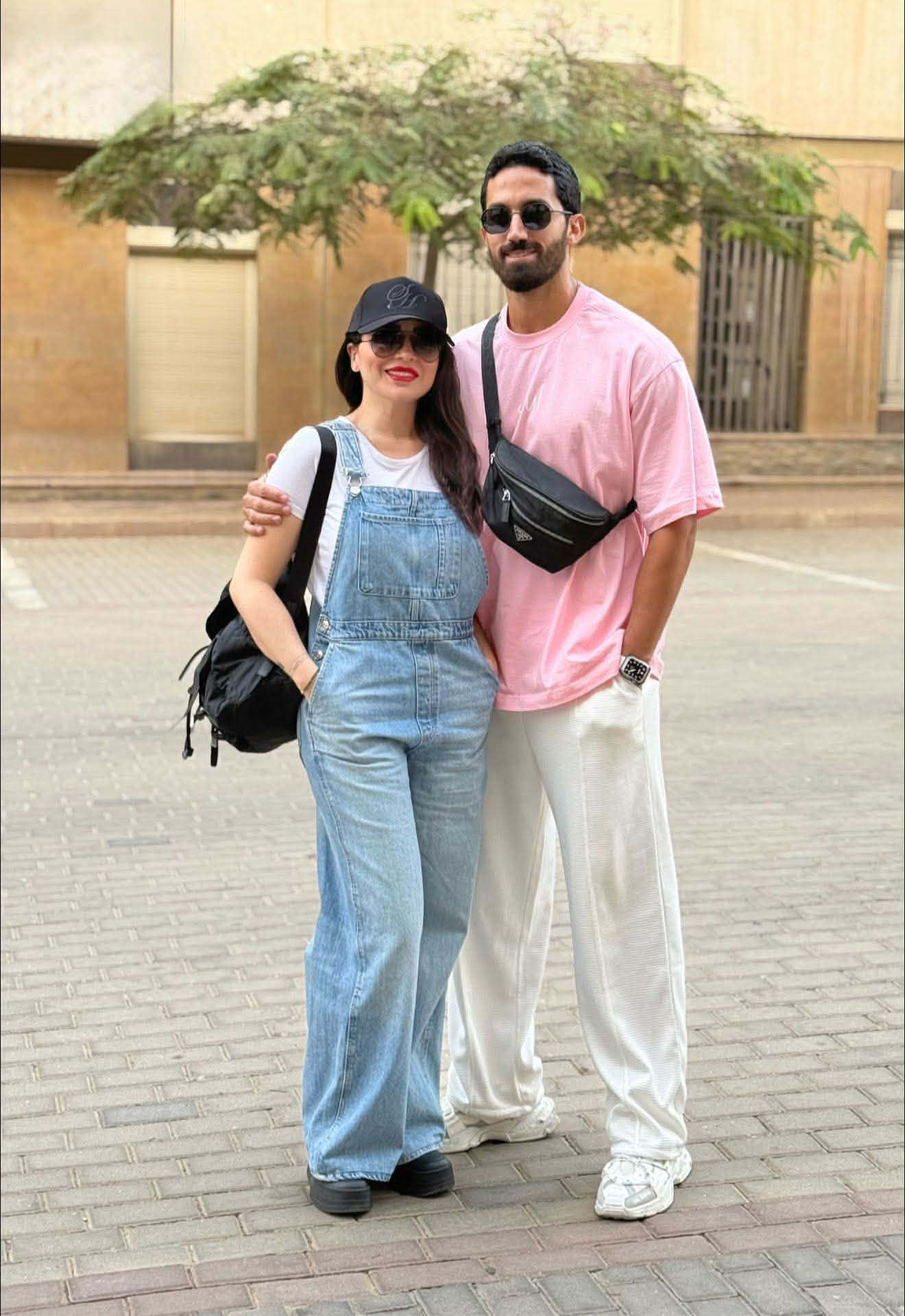 مى عزالدين وزوجها