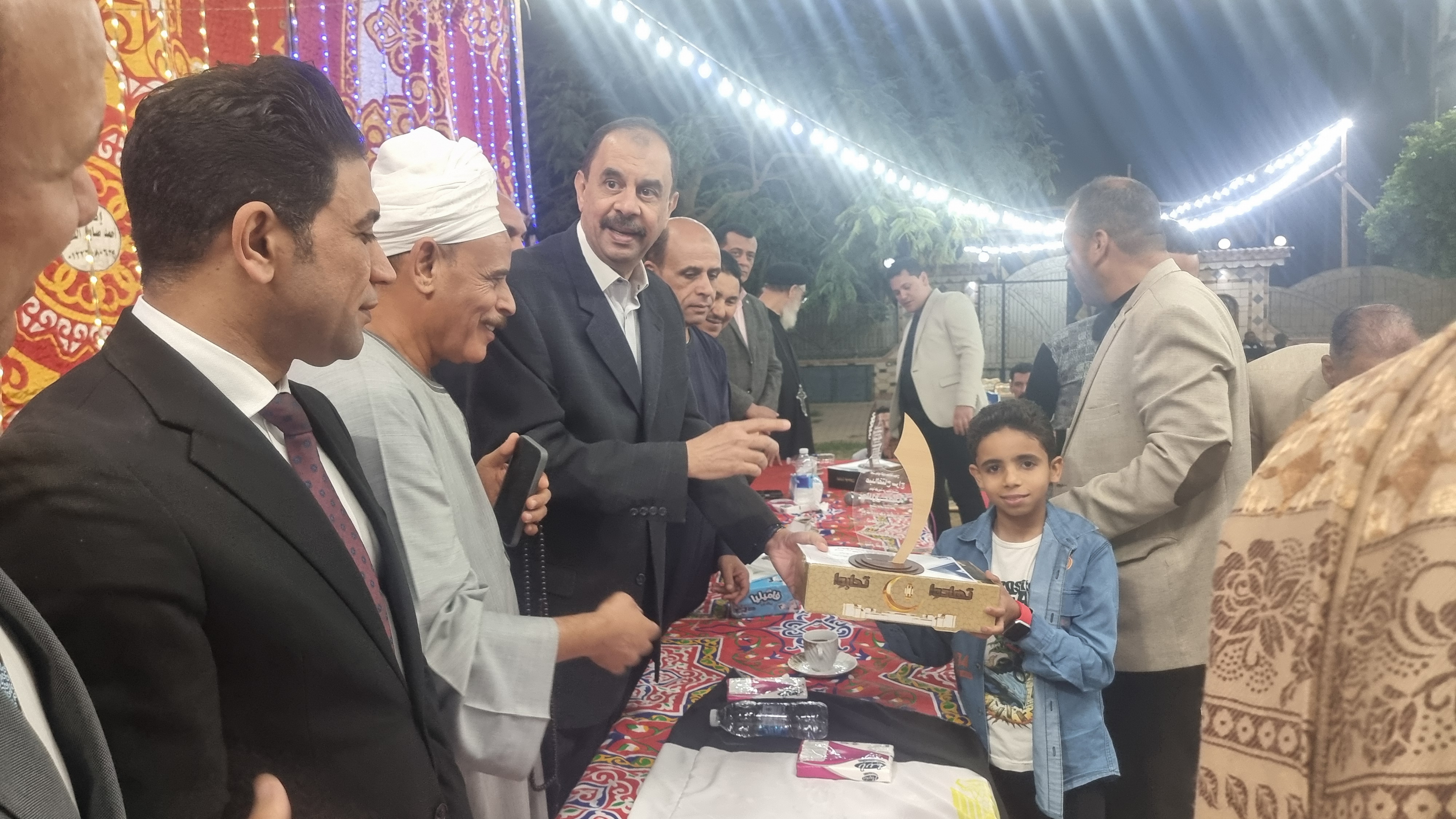 تكريم لأحد المتفوقين