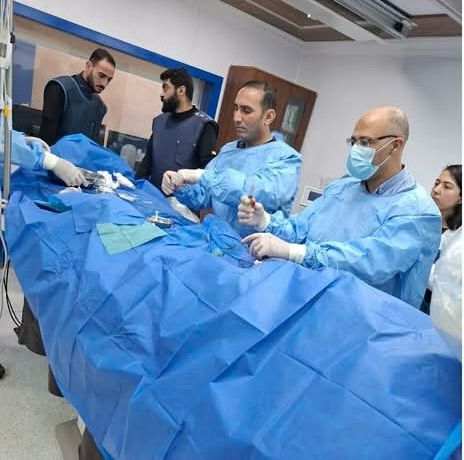 الفريق الطبى أثناء العمل بالمستشفى الفريق الطبى أثناء العمل بالمستشفى