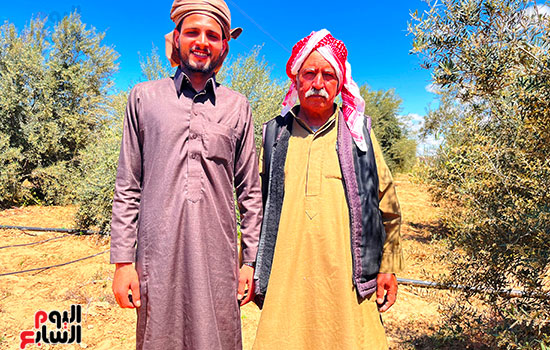 مع-نجله-عدنان مع-نجله-عدنان