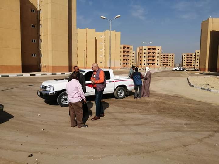 جانب من حل أزمة عمارات إسكان الطود