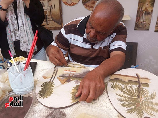 أحمد يرسم بمعرض الزهور أحمد يرسم بمعرض الزهور