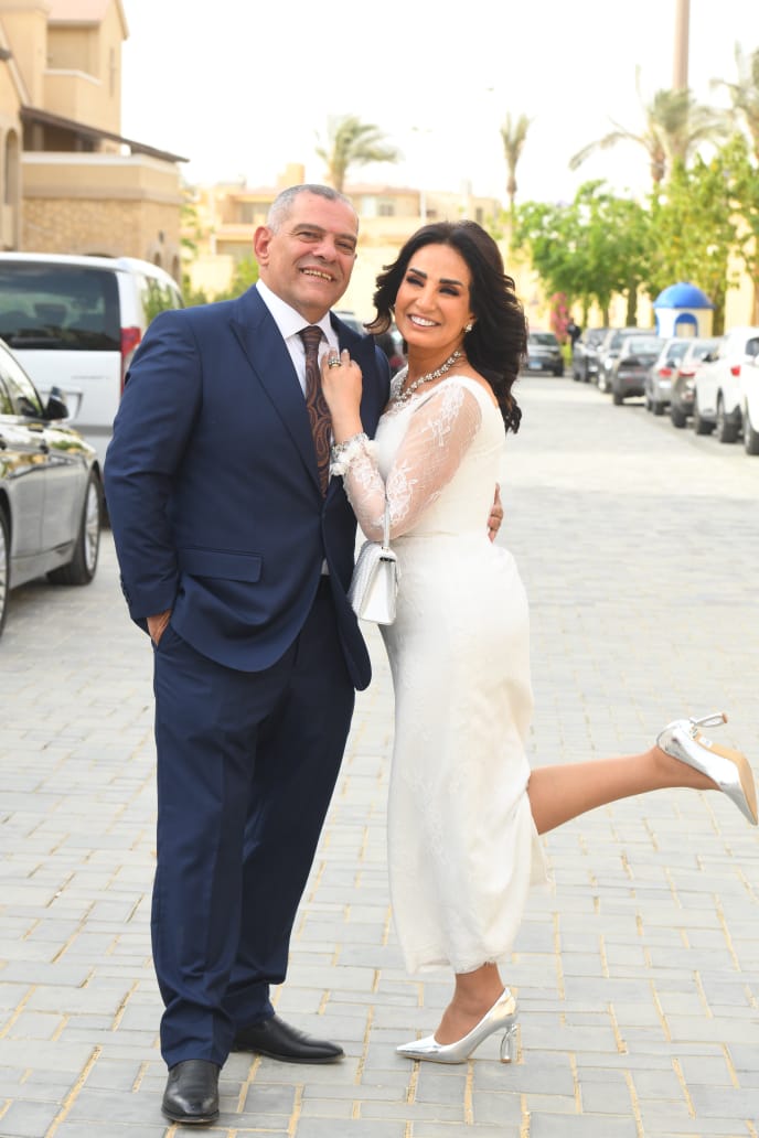 أمل رزق وزوجها