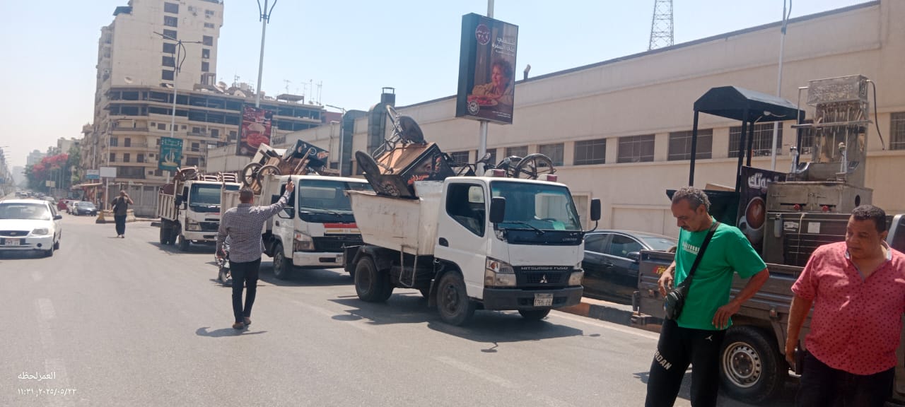 رفع الإشغالات والتعديات خلال حملة بالدقي