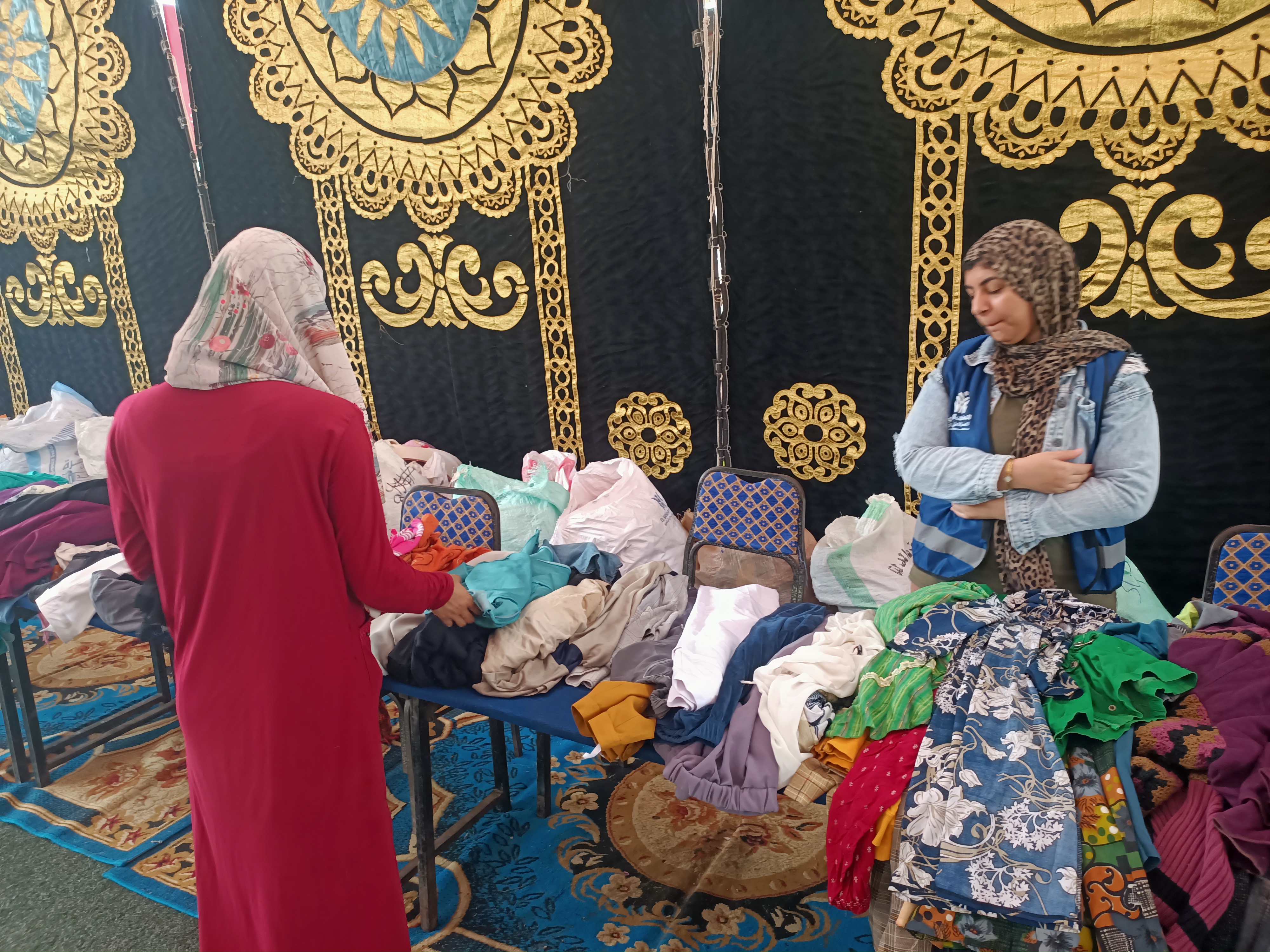 جانب من معرض ملابس بالمجان ضمن القافلة التنموية الشاملة بقرية العراقية بالمنوفية جانب من معرض ملابس بالمجان ضمن القافلة التنموية الشاملة بقرية العراقية بالمنوفية