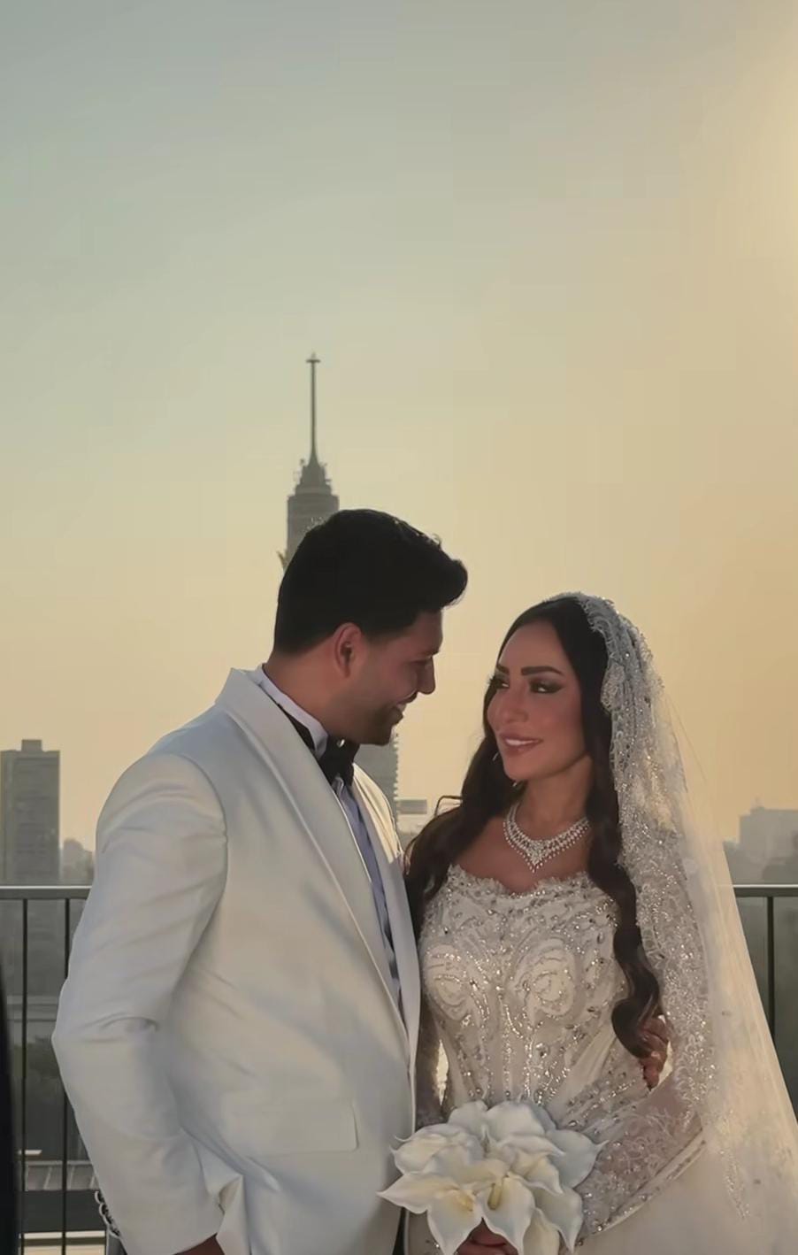 محمد شاهين ورشا الظناوي