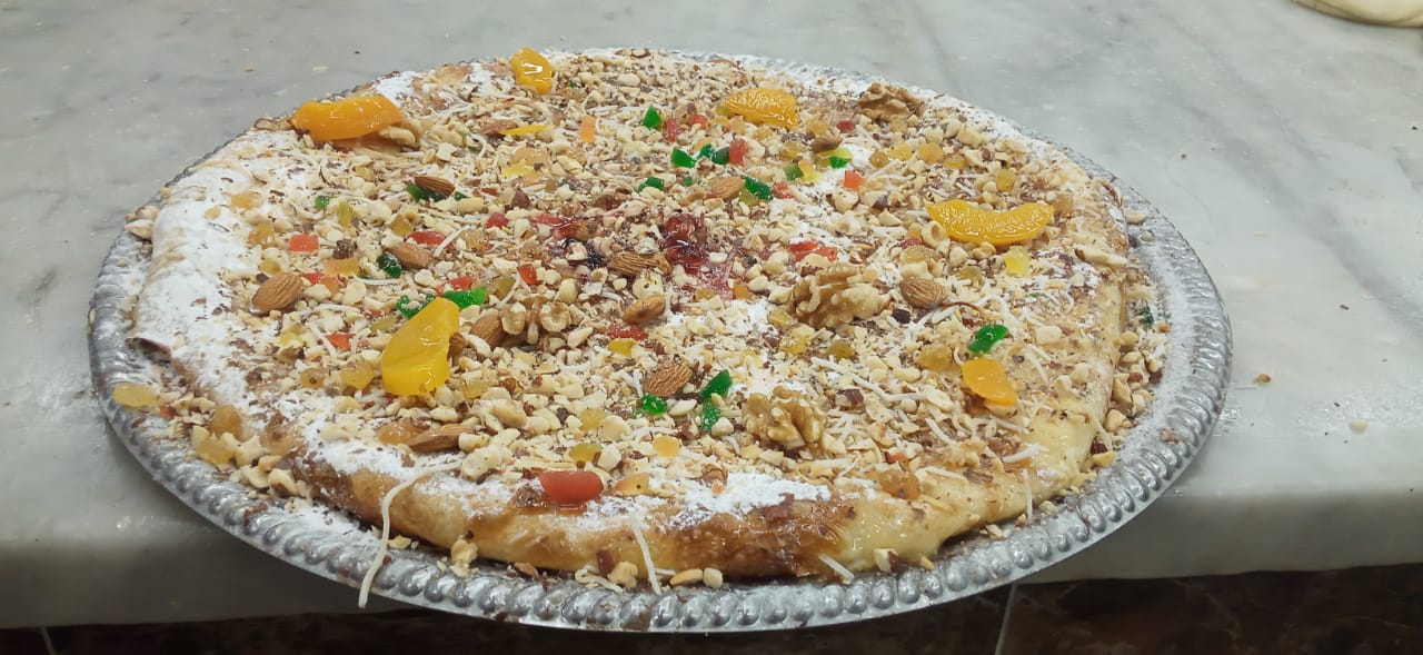 فطير بالبطارخ.. أحدث تقاليع صُنّاع الحلويات فى دمياط احتفالاً بالعيد (1)