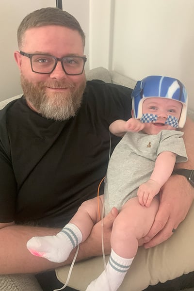 nash-keen-most-premature-baby-aged-ten-months-with-dad-randall