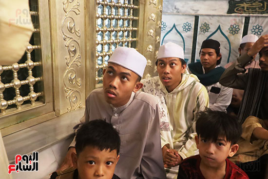 مسلمون-من-ماليزيا-يشاركون-بالمولد مسلمون-من-ماليزيا-يشاركون-بالمولد
