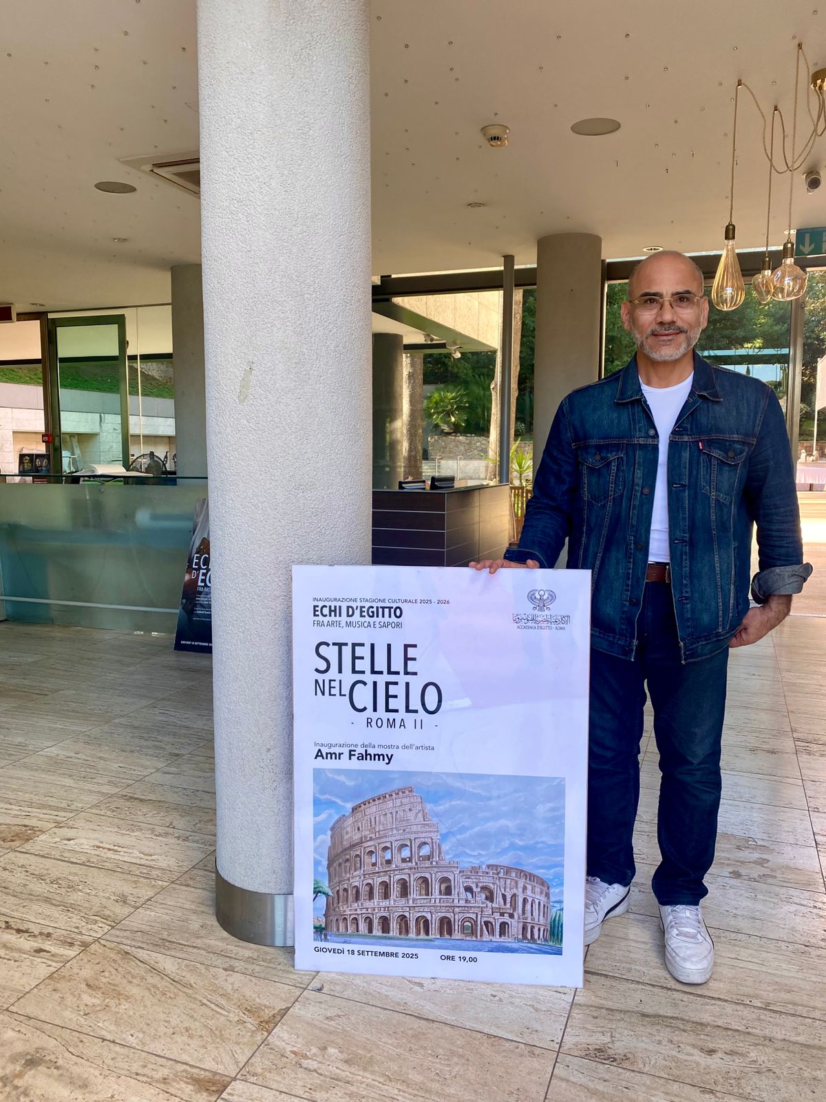 عمرو فهمي  وبوستر المعرض