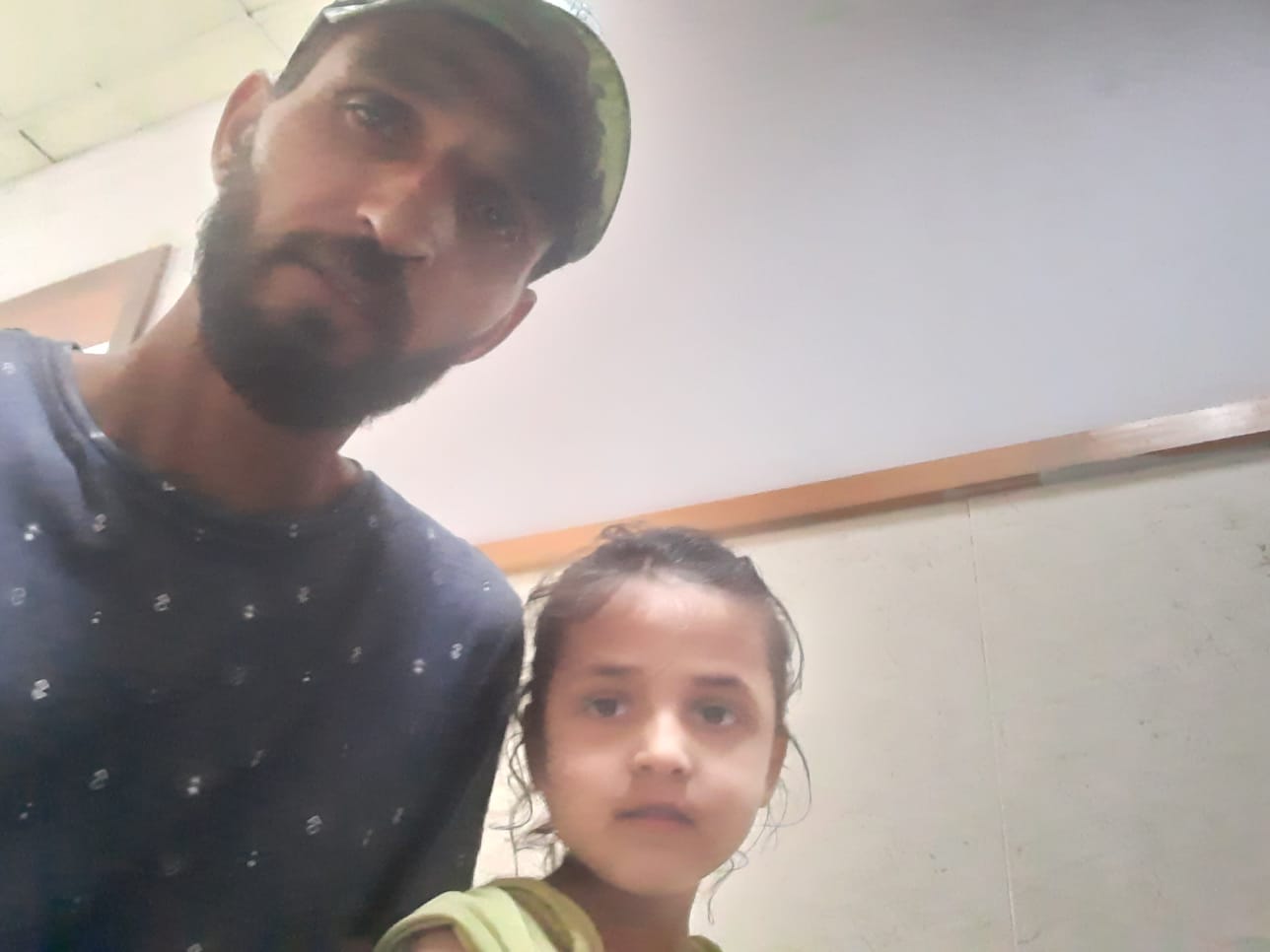 الشهيد محمد شعلان وابنته مريم