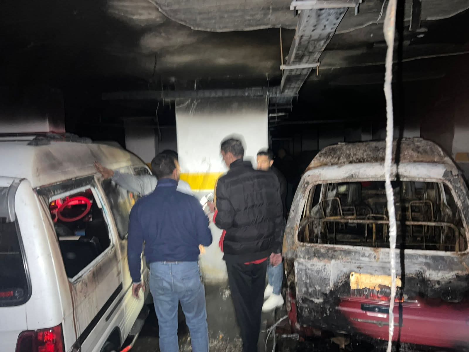 معاينة حريق جراج غرب الإسكندرية