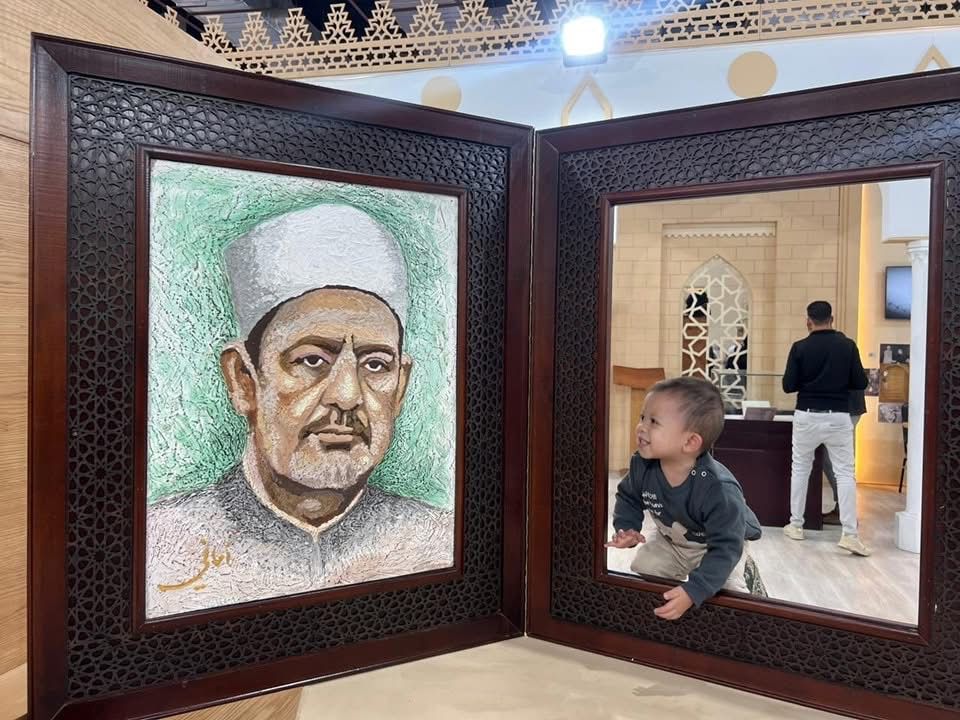 صورة الإمام الطيب بمعرض الكتاب