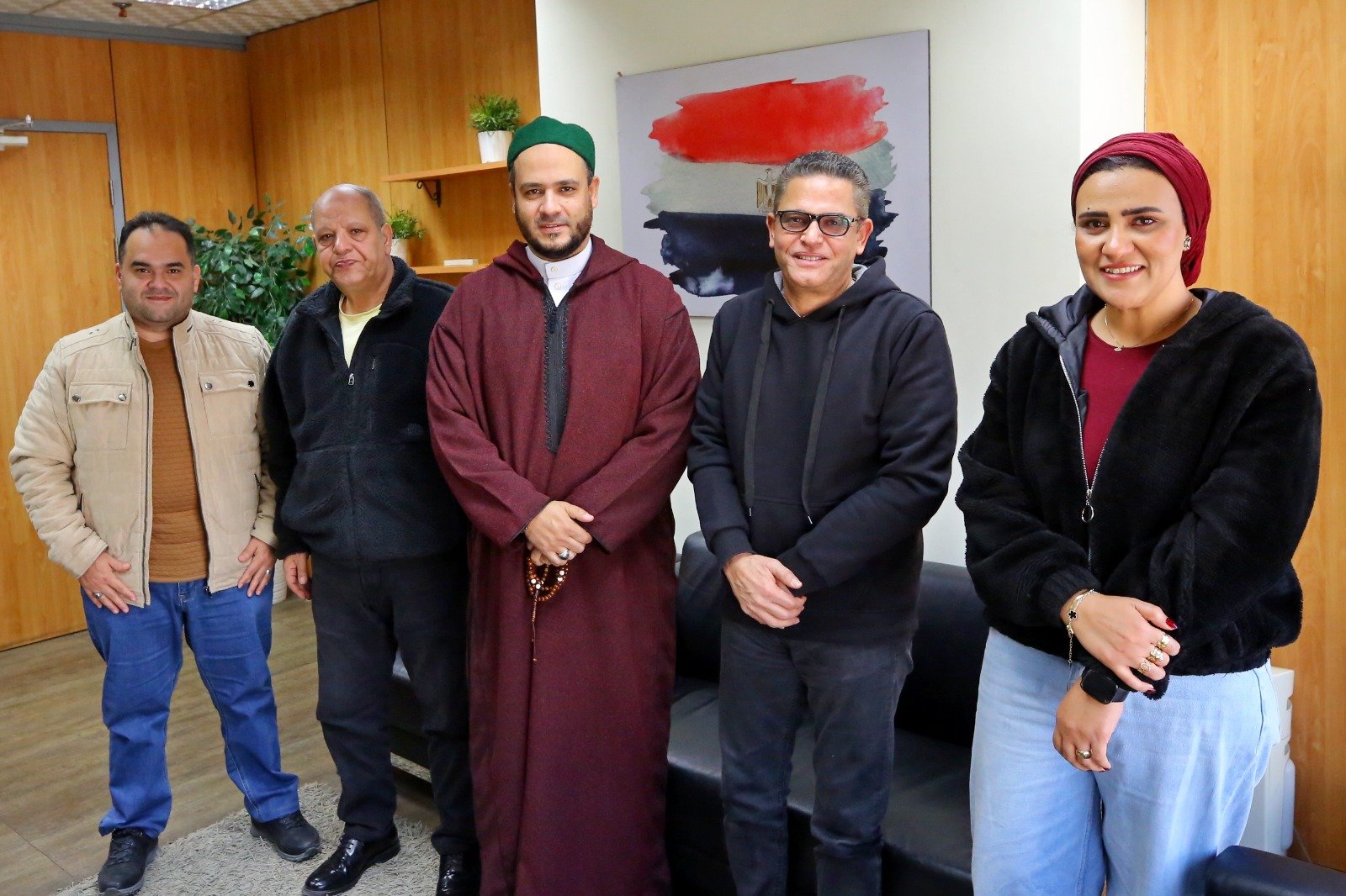 رئيس التحرير والكاتب الصحفى سعيد الشحات والزميل لؤى على والزميلة هند مختار مع الدكتور احمد المالكى