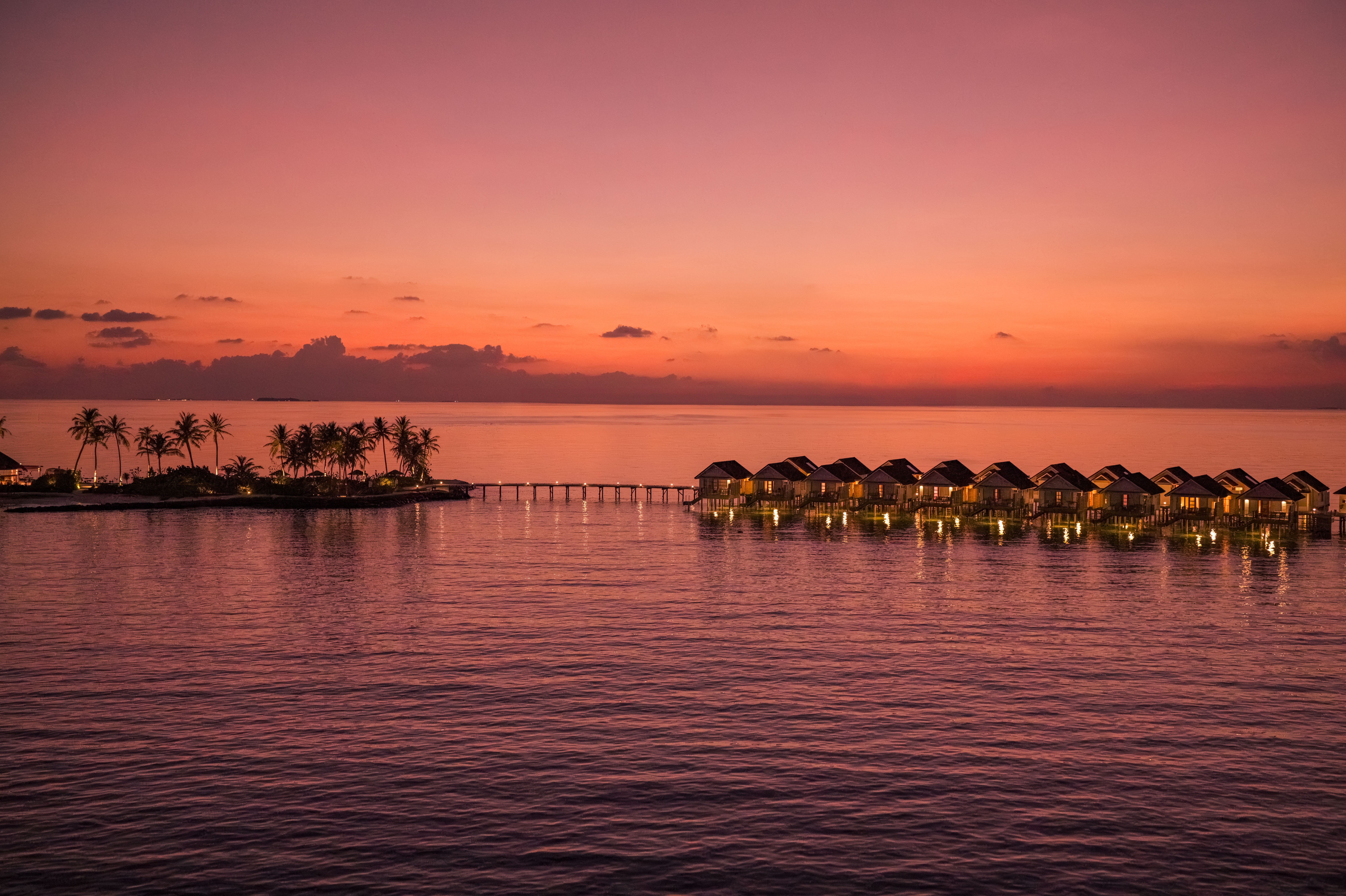 OBLU SELECT Lobigili - Island Aerial  - Sunset - Nest Water Villa - 02