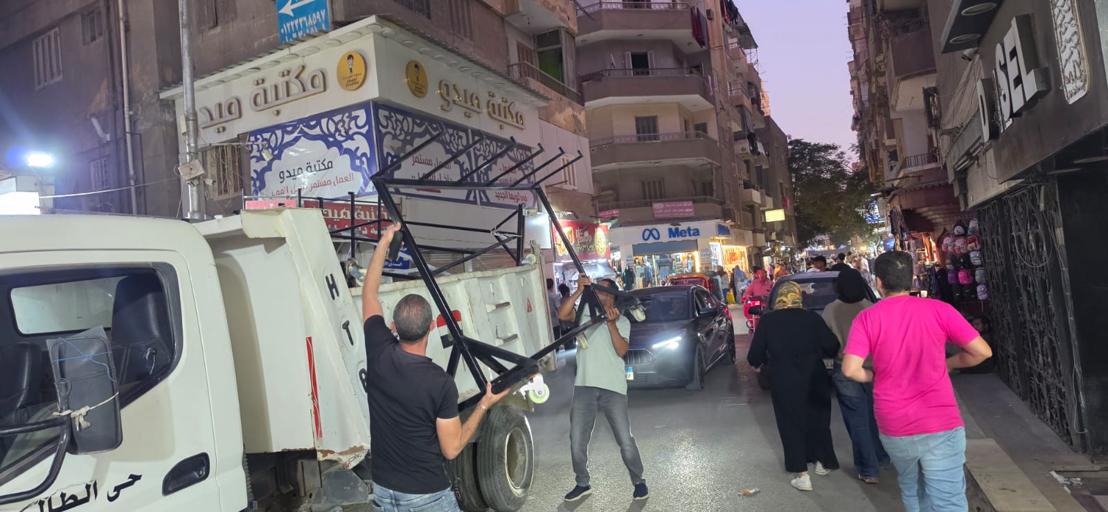 حملة بشوارع الطالبية لمواجهة إشغالات المحلات