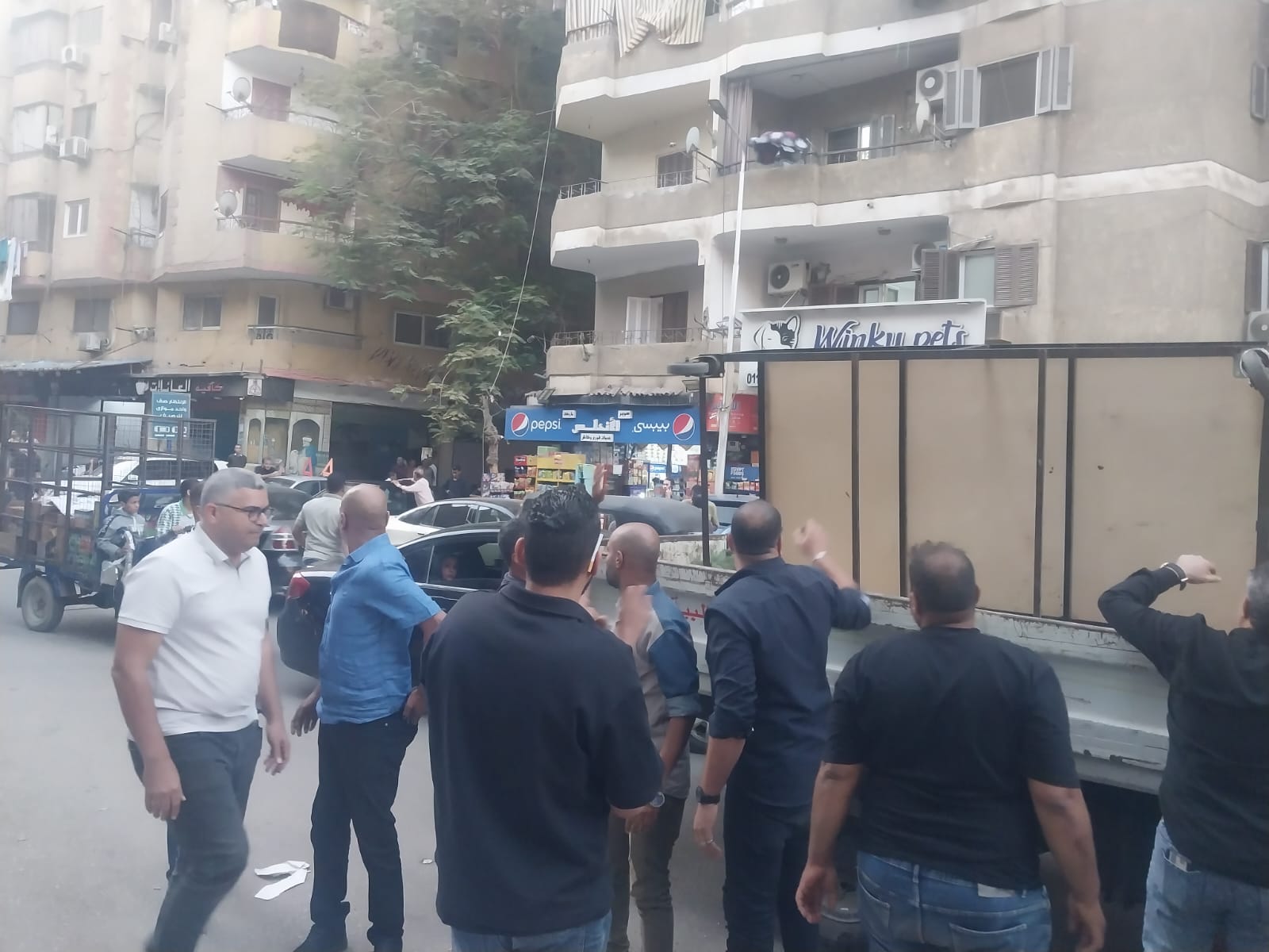 حملة بشوارع الطالبية لمواجهة إشغالات المحلات